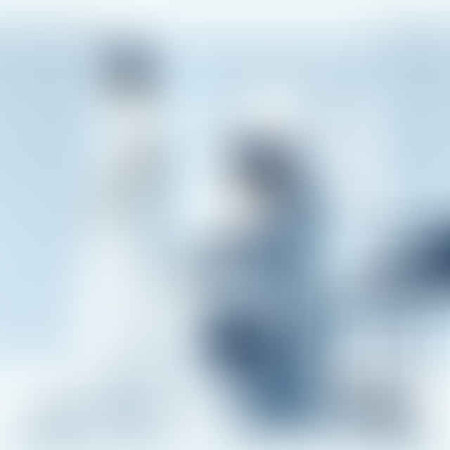 Final confirmation of a wedding dress bustle with a seamstress